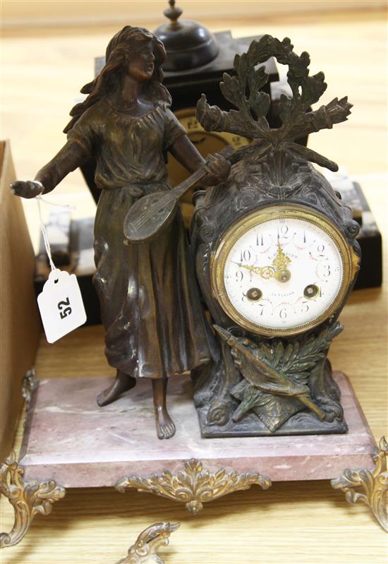 A French spelter and marble mantel clock and another black marble clock